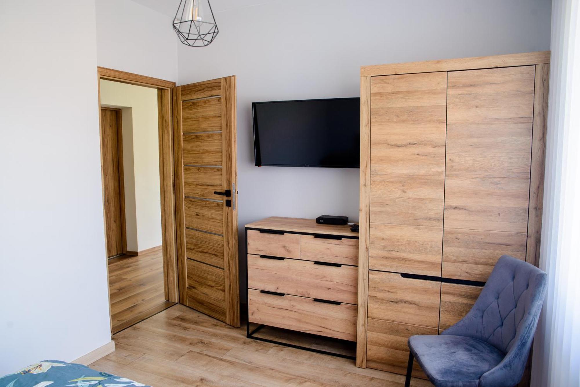 מוז'ינה Apartamenty Trio מראה חיצוני תמונה