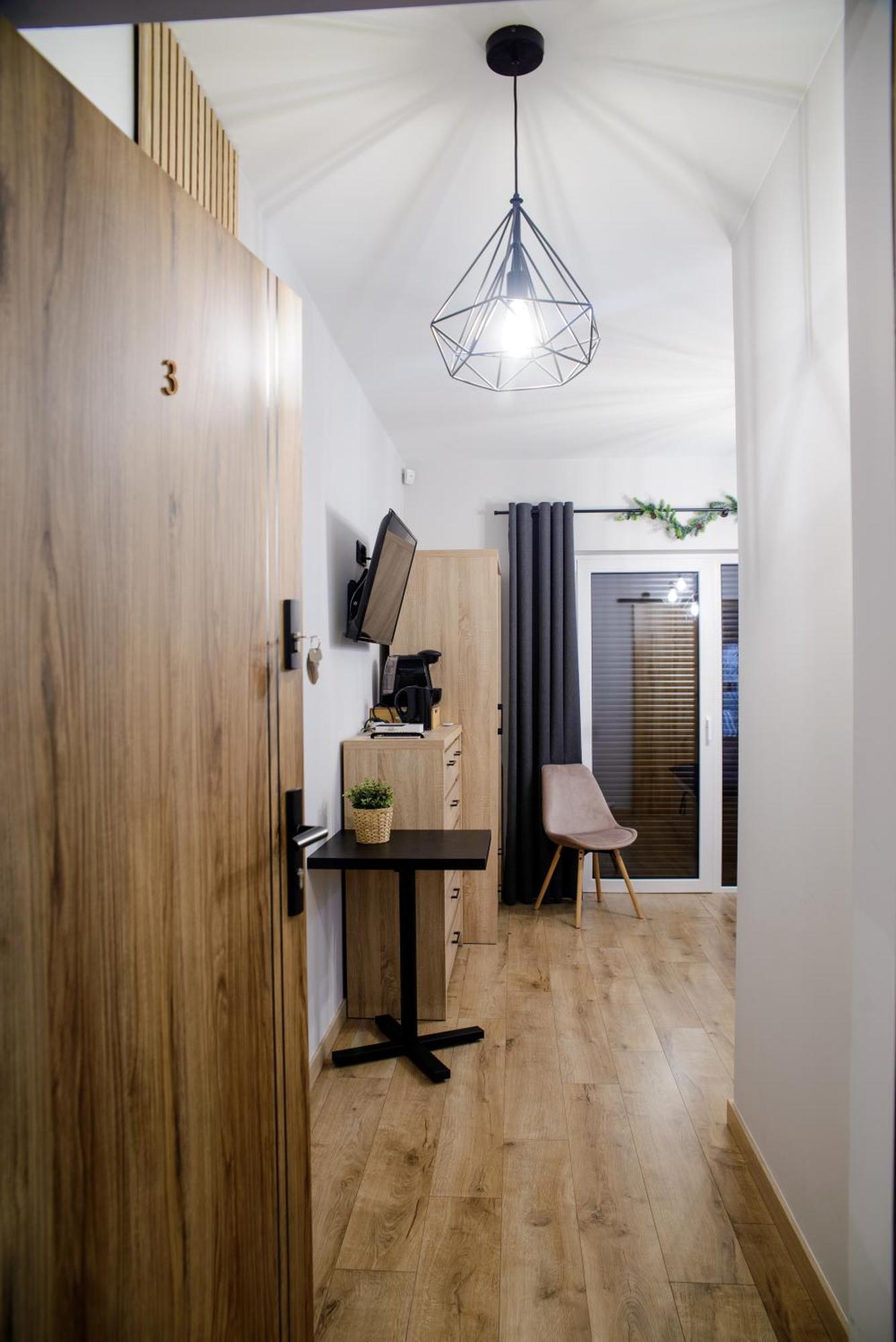 מוז'ינה Apartamenty Trio מראה חיצוני תמונה